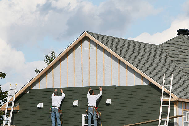 Professional Siding Installation technician working in Drayden, MD